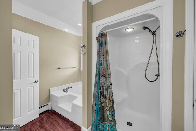 bathroom featuring curtained shower, a baseboard heating unit, hardwood / wood-style floors, and ornamental molding