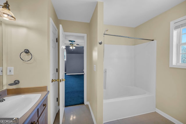 bathroom featuring vanity, tile floors,  shower combination, and ceiling fan