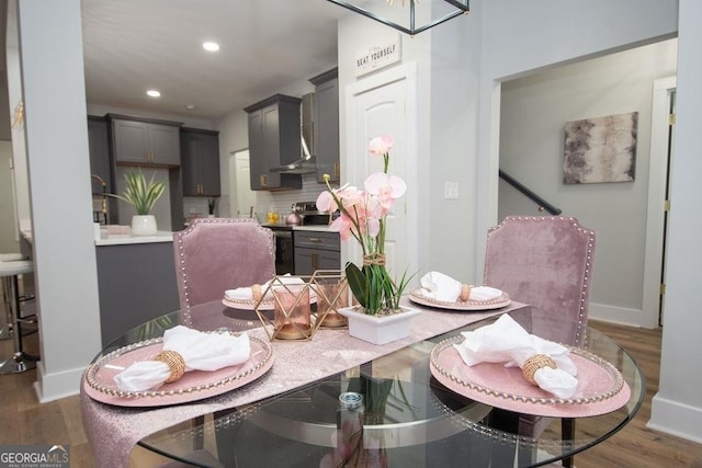 dining space featuring dark hardwood / wood-style flooring