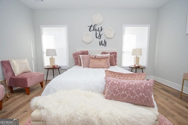 bedroom featuring light wood-type flooring