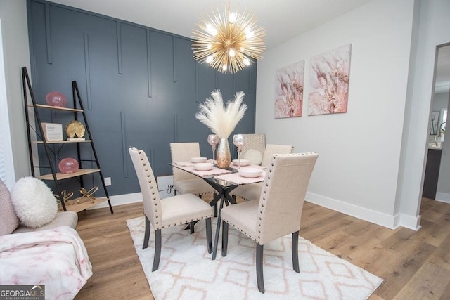 dining room with light hardwood / wood-style flooring