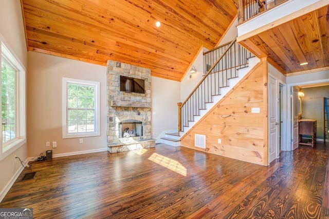 228 Harris Rd, Jackson, GA 30233 - unfurnished living room featuring wooden ceiling, a healthy amount of sunlight, and hardwood / wood-style floors