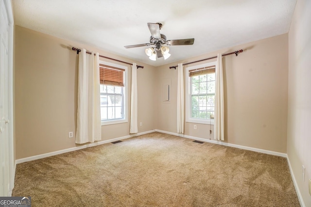 228 Harris Rd, Jackson, GA 30233 - empty room with ceiling fan and carpet flooring
