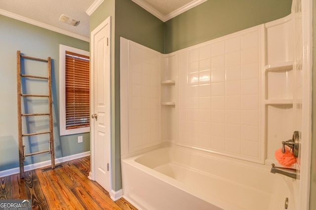 228 Harris Rd, Jackson, GA 30233 - bathroom with ornamental molding, hardwood / wood-style flooring, and shower / washtub combination