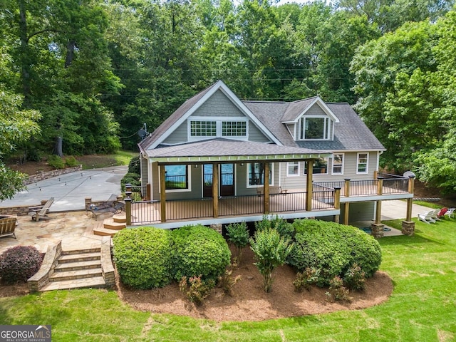228 Harris Rd, Jackson, GA 30233 - rear view of property featuring a deck and a patio