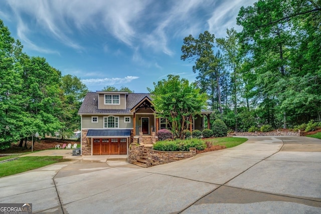 228 Harris Rd, Jackson, GA 30233 - craftsman house featuring a garage
