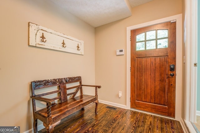 228 Harris Rd, Jackson, GA 30233 - foyer with a textured ceiling and hardwood / wood-style floors