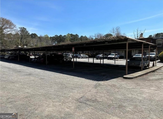 view of car parking featuring a carport