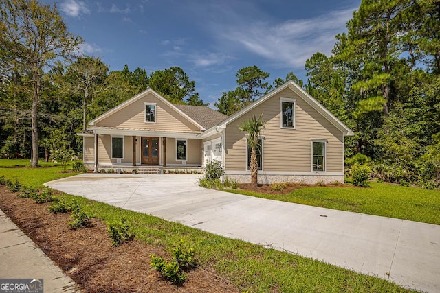 view of front of house with a porch and a front yard