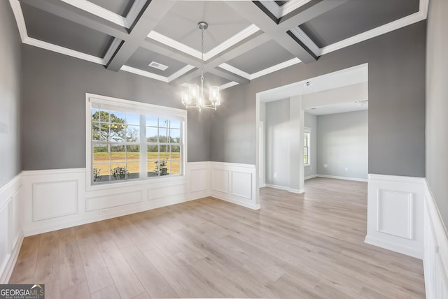 foyer entrance featuring beam ceiling, coffered ceiling, and dark wood-type flooring