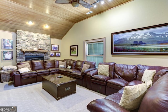 living room featuring a fireplace, carpet, wood ceiling, lofted ceiling, and ceiling fan