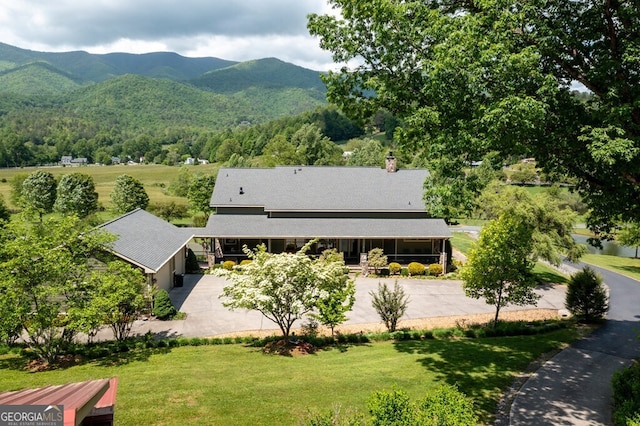 bird's eye view with a mountain view