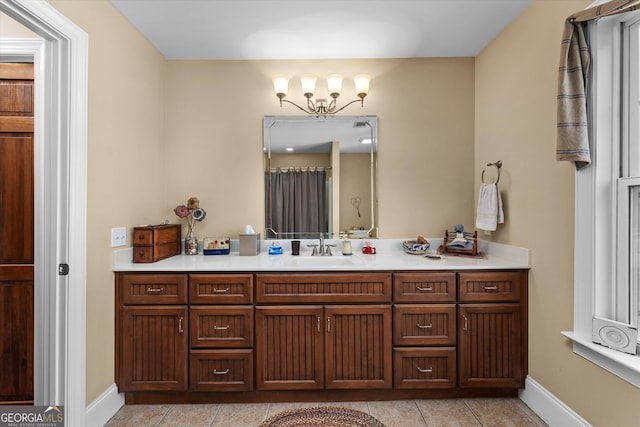 bathroom featuring vanity and tile floors