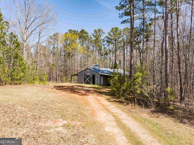 view of front of home with an outdoor structure