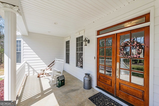 entrance to property with a porch