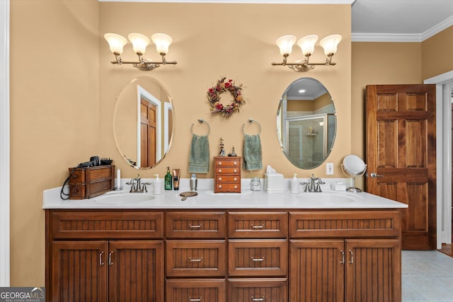 bathroom with tile flooring, ornamental molding, dual vanity, and an inviting chandelier