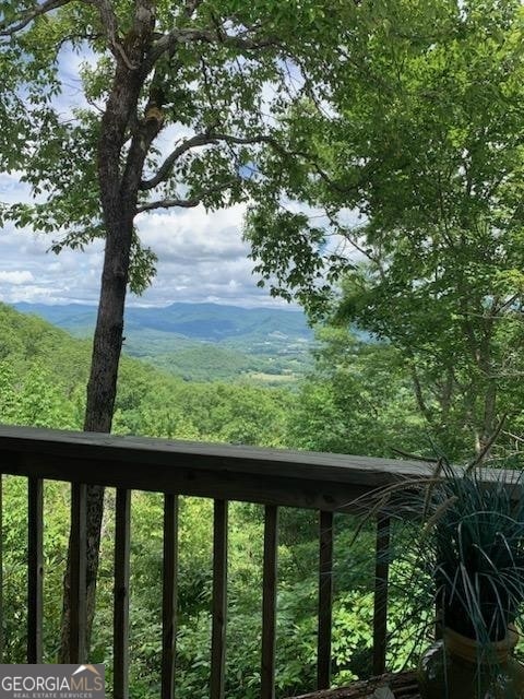 exterior space featuring a mountain view