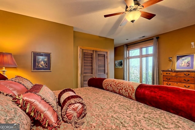 bedroom featuring a closet and ceiling fan