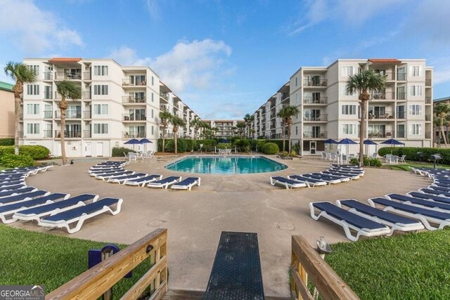 view of pool featuring a patio area