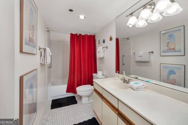 full bathroom featuring tile floors, toilet, shower / bath combo, a chandelier, and vanity with extensive cabinet space