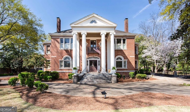 view of greek revival inspired property