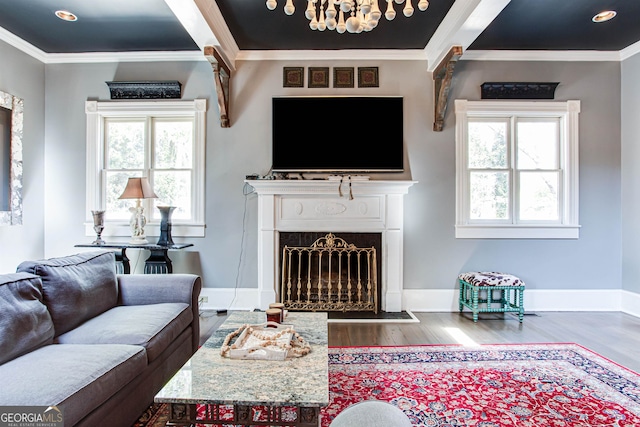 living room with dark hardwood / wood-style flooring and crown molding