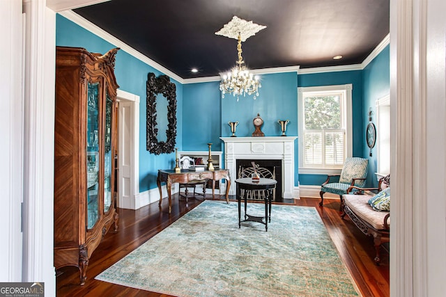 interior space featuring an inviting chandelier, ornamental molding, and dark hardwood / wood-style floors