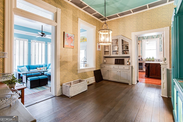 interior space featuring ceiling fan and dark wood-type flooring