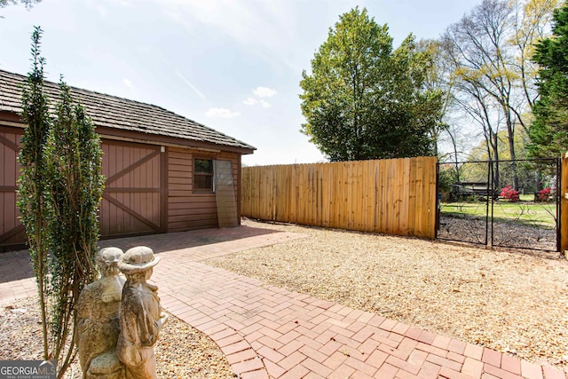 view of terrace with a shed