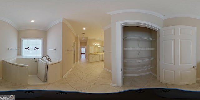 interior space with a washtub, tile floors, and crown molding