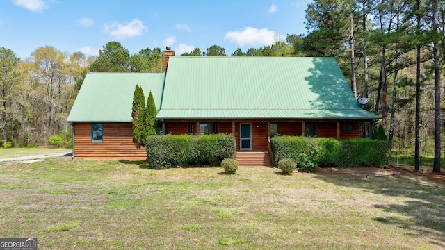 view of front of property with covered porch and a front lawn