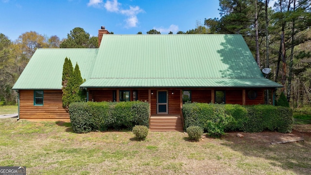 log-style house with covered porch