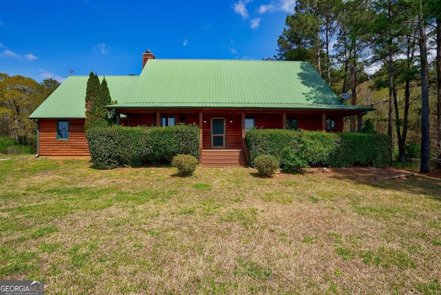 view of front of home featuring a front lawn