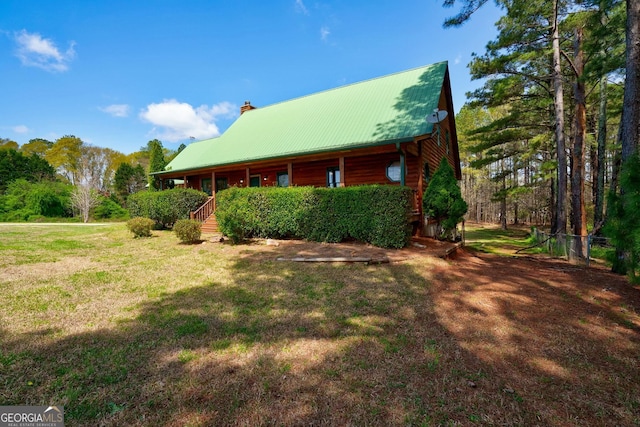 exterior space featuring a front yard