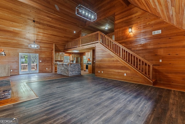 unfurnished living room with wooden ceiling, high vaulted ceiling, and dark hardwood / wood-style floors