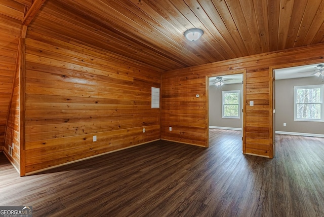 spare room with wooden ceiling, ceiling fan, and dark hardwood / wood-style floors