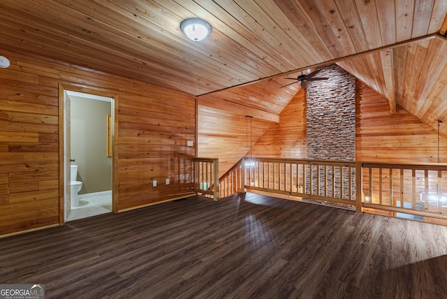 additional living space featuring wooden ceiling, ceiling fan, lofted ceiling, and dark wood-type flooring