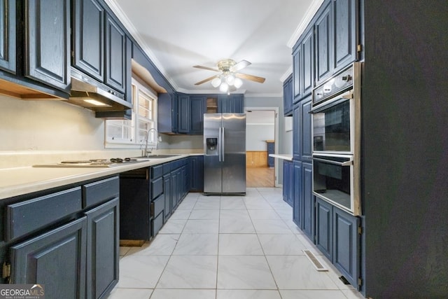 kitchen featuring stainless steel appliances, light tile flooring, ceiling fan, ornamental molding, and sink