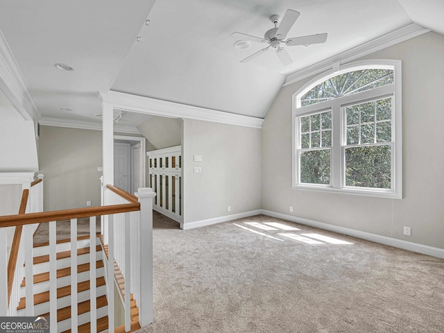 additional living space with light carpet, lofted ceiling, and ceiling fan