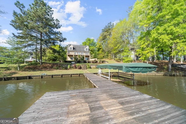 dock area featuring a water view