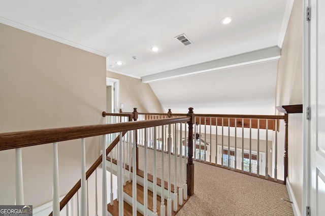 corridor with crown molding, carpet, and lofted ceiling with beams