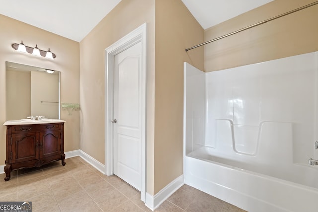 bathroom with vanity, tub / shower combination, and tile floors