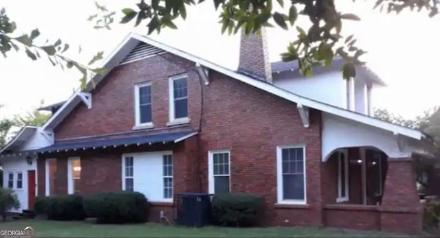 view of front of house with central air condition unit