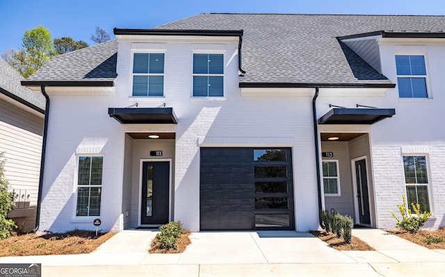 view of front of property featuring a garage