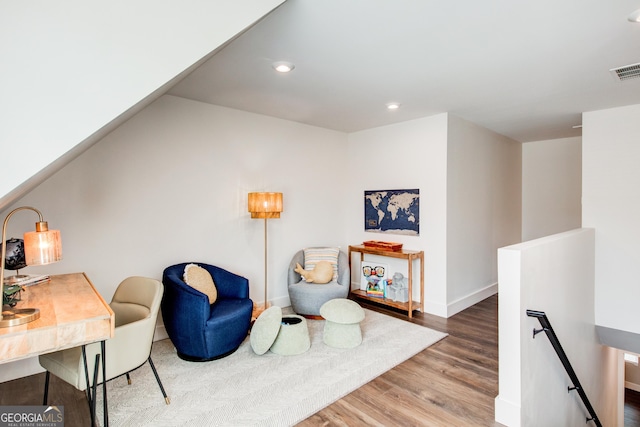 living area with wood-type flooring