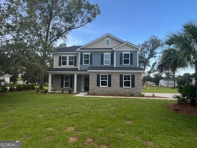 view of front facade with a front yard