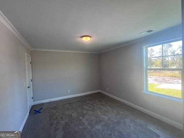 35 Fairwinds Unit 207, Waverly, GA 31565 - unfurnished room with carpet floors, baseboards, visible vents, and ornamental molding