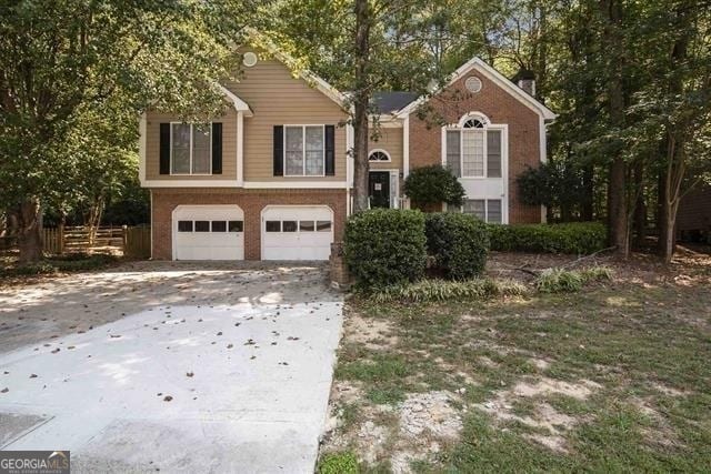 split foyer home featuring a garage