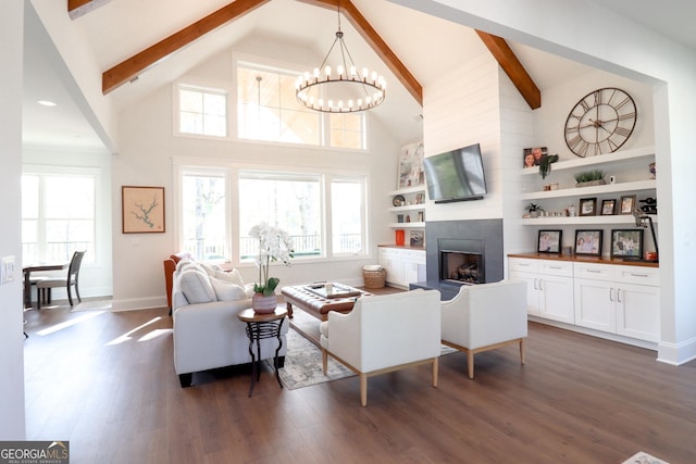 living room featuring high vaulted ceiling, beam ceiling, dark hardwood / wood-style flooring, and a tiled fireplace