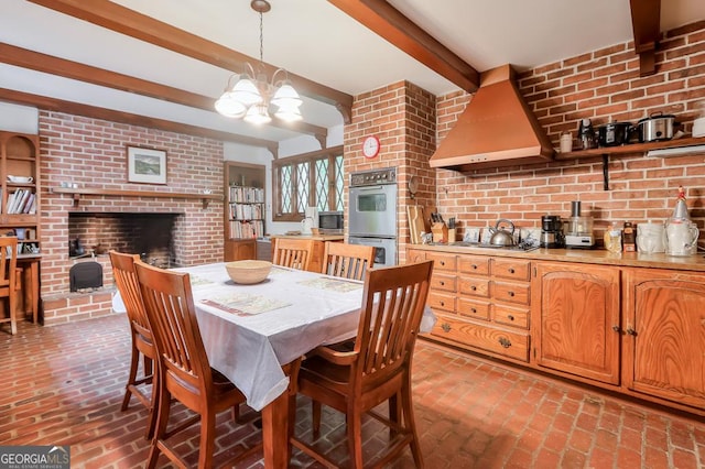 dining room featuring beam ceiling and an inviting chandelier